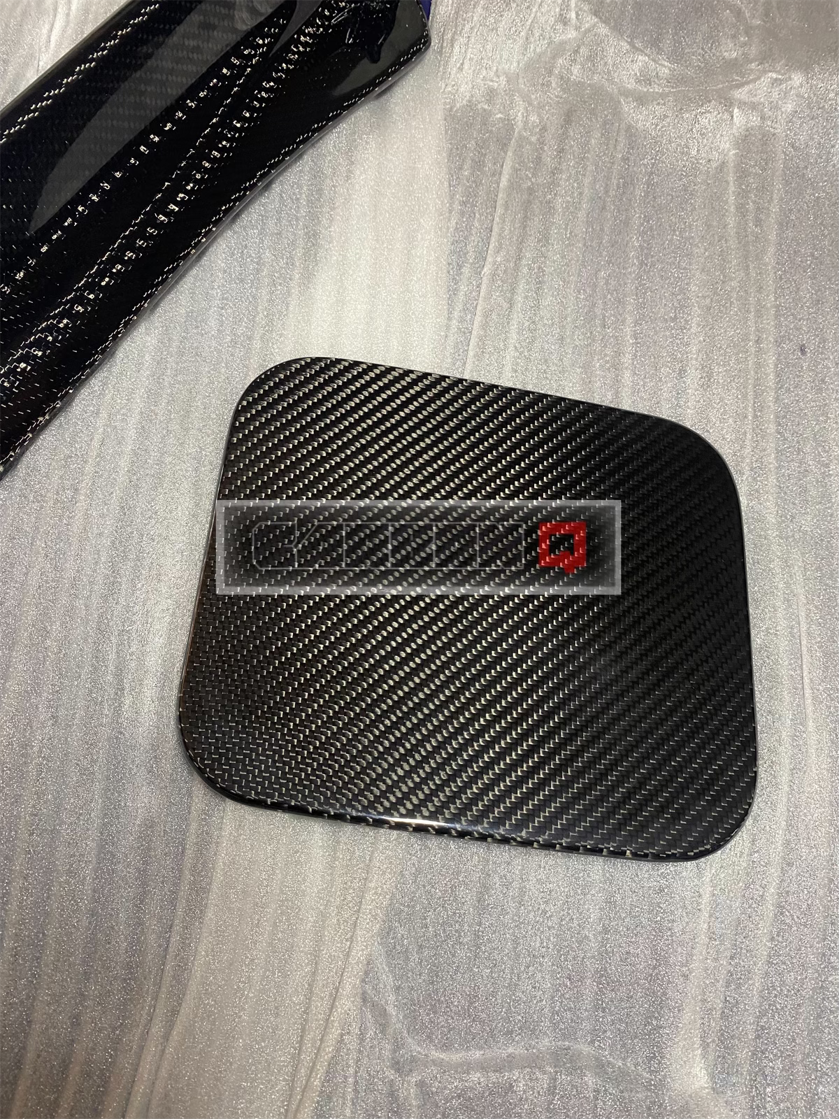 Q50 Carbon Fiber Gas Cover Overlay